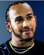  ??  ?? World champion Lewis Hamilton