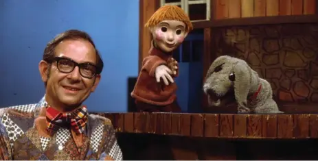  ??  ?? The various piano accompanim­ents courtesy of the late Donald Himes helped create a sense of serenity in Mr. Dressup, starring Ernie Coombs.