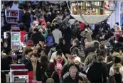  ?? THE ASSOCIATED PRESS ?? Shoppers are seen crowded into a Macy’s store.