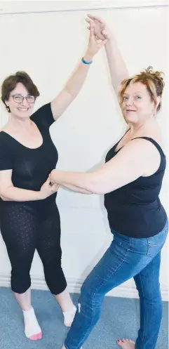  ??  ?? Ballet teacher Jo Watt works with Diane Bruniges-Gregory to help her achieve her dream of attending ballet classes.