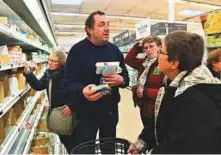  ?? AFP ?? Farmer Ghislain De Viron holds butter made from a blend of EU milk as a substitute for French butter in the hyper market Leclerc d’Alllonnes, near Le Mans, northweste­rn France.