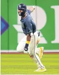  ?? USA TODAY SPORTS ?? The Rays’ Amed Rosario celebrates after hitting a walk off RBI single in the 13th inning.