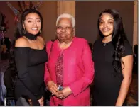  ?? ?? Past inductee Irma Hunter Brown (center) with Railen Mason and Kaivyn Coleman
