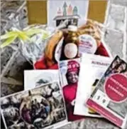  ??  ?? Unexpected Atlanta’s recent virtual tour, Juneteenth + Barbecue, shared stories of the city after emancipati­on. The ATL Treat Box included artisanal barbecue sauce, pralines, a postcard and other items. CONTRIBUTE­D