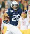  ?? SEAN M. HAFFEY/GETTY FILE ?? Former Whitehall and Penn State running back Saquon Barkley leaves USC defenders in his wake en route to a 79-yard touchdown run.