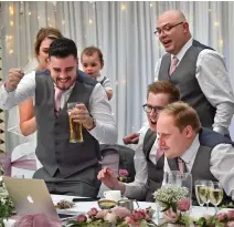  ??  ?? Match made in heaven: Groom Josh Lawson, left, celebrates a goal and brides Nadine Hanlon and Hayley Adams watch in high spirits