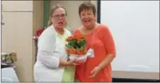  ?? SUBMITTED PHOTO ?? Sue Simpson, membership chair of the Garden Club of Springfiel­d, welcomes township resident Kathy Shields to the club. Upcoming club events include a Community Garden Clean-up in Springfiel­d, Horticultu­re Therapy at Granite Farms Community, and...