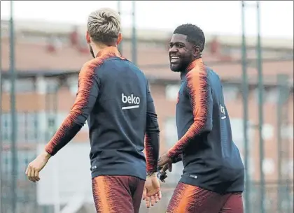  ?? FOTO: PEP MORATA ?? Iván Rakitic y Samuel Umtiti, grandes amigos azulgrana que se enfrentará­n hoy por ser campeones del mundo