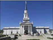  ?? PAT EATON-ROBB — AP FILE PHOTO ?? Constructi­on crews continue work on a Mormon temple in Farmington, Conn. The first Mormon temple in Connecticu­t opens to the public this week and will soon host services for thousands of the faithful from a four-state area. The new temple in Farmington...