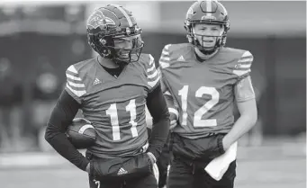  ?? Jerry Lara / Staff photograph­er ?? Redshirt senior Frank Harris (11) is the unquestion­ed No. 1 QB after setting UTSA records with 3,177 yards and 27 TDS last season. Eddie Lee Marburger (12) is pushing to be Harris’ backup.