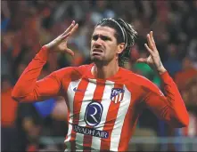  ?? REUTERS ?? Rodrigo De Paul celebrates scoring Atletico Madrid’s opening goal in a 2-1 win over Borussia Dortmund on Wednesday.