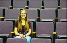  ?? PETER HUOPPI/THE DAY ?? Hannah Morrison, a senior at Lyme-Old Lyme High School, poses for a portrait on May 16 in the school auditorium where she was a cast member in the production of the musical “Anything Goes.”