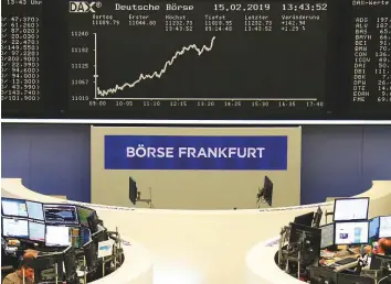  ?? Reuters ?? The stock exchange in Frankfurt. MSCI’s gauge of stocks across the globe gained 0.57 per cent.