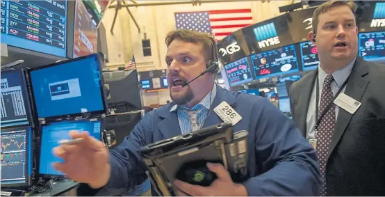  ?? [ AFP ] ?? Börsianer brauchen gute Nerven – wie hier an der New York Stock Exchange.