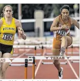  ?? RODOLFO GONZALEZ / AMERICAN-STATESMAN ?? Texas’ Melissa Gonzales (right) competes against Wyoming’s Erin Kirby in the 400-meter hurdles Thursday. Gonzales qualififie­d for the quarterfif­inals.