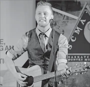  ?? Booster photo by Scott Anderson ?? Codie Prevost, a five-time Saskatchew­an Country Music Award Fans Choice Entertaine­r of the Year, shares his anti-bullying message during the Imagine No Bullying tour stop in Swift Current on Dec. 4.