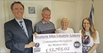  ??  ?? Alasdair Allan MSP, left, with Tony Robson, Janet Paterson and Emma Fraser from the Western Isles Lifestyle Lottery.