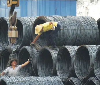  ?? AP ?? Steel market in Yichang in central China. Trump plans to impose a 25 per cent tariff on steel and aluminium imports into the US