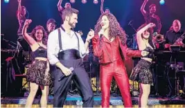  ?? MATTHEW MURPHY/COURTESY ?? Mauricio Martinez as Emilio Estefan and Christie Prades as Gloria Estefan in “On Your Feet: The Emilio and Gloria Estefan Broadway Musical,” at the Arsht Center in Miami.