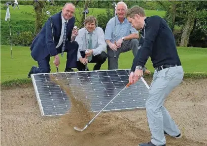  ??  ?? Gatley golf club members take receipt of the solar panels