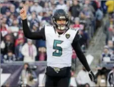  ?? STEVEN SENNE — THE ASSOCIATED PRESS ?? Jaguars quarterbac­k Blake Bortles celebrates a touchdown run by running back Leonard Fournette during the the AFC Championsh­ip Game.