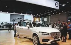  ?? Reuters ?? A Volvo XC90 at the Shanghai Auto Show. Combining Volvo’s cars with Uber’s self-driving system builds on their nearly three-year relationsh­ip.