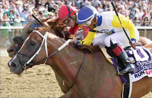  ?? DEBRA A. ROMA ?? The Charles Fipke homebred Bee Jersey wins the Metropolit­an Handicap in June. He will stand at Darby Dan Farm in Kentucky.