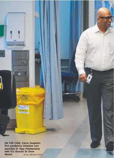  ?? Picture: BRENDAN RADKE ?? ON THE CASE: Cairns Hospital's first paediatric­s intensive care specialist Dr Vijay Palaniswam­y with ICU director Dr Drew Wenck.