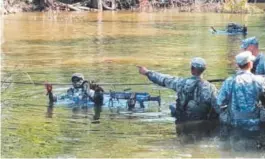  ??  ?? An Army Ranger student prepares to traverse the Yellow River as he takes on the third phase of Ranger School. Dan Lamothe, The Washington Post