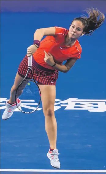  ?? AFP ?? Daria Kasatkina of Russia on her way to victory over China’s Wang Qiang yesterday