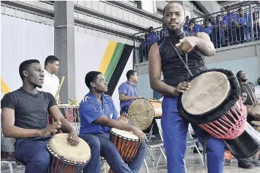  ?? IAN ALLEN/PHOTOGRAPH­ER ?? Jamaica College Drummers performing during the school’s Achievemen­t Day Awards ceremony yesterday, which was held at the institutio­n on Hope Road in St Andrew.