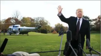  ?? MANUEL BALCE CENETA — THE ASSOCIATED PRESS ?? President Donald Trump speaks to the media before leaving the White House in Washington, Tuesday to travel to Florida.