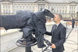  ?? ?? Cameraman James Neal at Buckingham Palace and Westminste­r Abbey