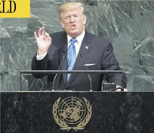  ?? DREW ANGERER / GETTY IMAGES ?? President Donald Trump addresses the United Nations General Assembly in New York Tuesday, where he referred to North Korean leader Kim Jong Un as “Rocket Man” and accused Iran of financing terror.