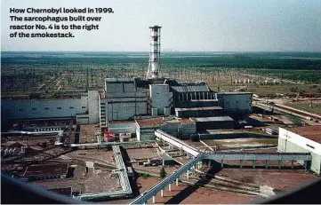  ?? How Chernobyl looked in 1999. The sarcophagu­s built over reactor No. 4 is to the right of the smokestack. ??