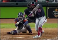  ?? ERIC GAY - THE ASSOCIATED PRESS ?? Washington Nationals’ Howie Kendrick hits a two-run home run against the Houston Astros in game seven of the World Series on Oct. 30, 2019.