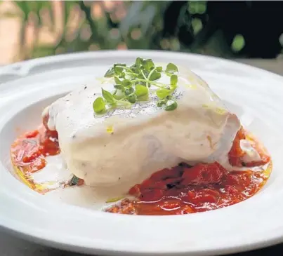  ?? MIKE STOCKER/STAFF PHOTOGRAPH­ER ?? The 42-layer lasagne from Louie Bossi's Ristorante, Bar and Pizzeria.