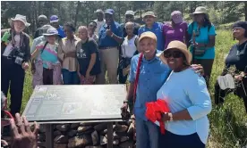  ?? Photograph: Courtesy Vibe Tribe Adventures ?? People gathered at the opening of the Winston Walker trail loop.