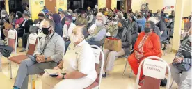  ?? ?? Residents listen during a meeting of the state Distressed Unit Appeal Board in Gary on Thursday,