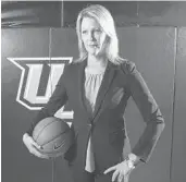  ?? STEPHEN M. DOWELL/ORLANDO SENTINEL ?? UCF women's basketball coach Katie Abrahamson-Henderson and the Knights are pushing to build on their success when they host Cincinnati on Sunday at CFE Arena.