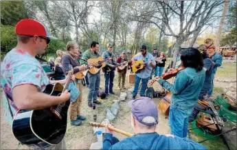  ?? Courtesy photo
/ Michael Sharps ?? Max Delacy’s friends and family held an impromptu celebratio­n of life at Columbia State Historic Park on Tuesday night following his death.