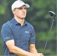  ??  ?? Spieth watches his shot from the 14th tee during the final round of the Travelers Championsh­ip at TPC River Highlands in Cromwell, Connecticu­t. — AFP photo