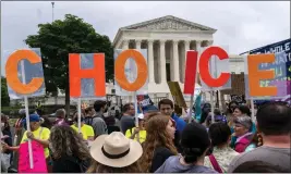  ?? JACQUELYN MARTIN — AP PHOTO ?? Abortion rights demonstrat­ors hold up letters spelling out “My Choice” on Saturday outside the Supreme Court in Washington.