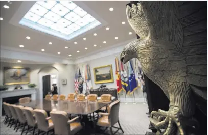  ?? Carolyn Kaster ?? The Associated Press An eagle is seen in the Roosevelt Room of the White House. “It’s a very patriotic symbol,” interior designer John Botello said.