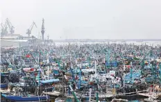  ?? Reuters ?? ■
Fishing boats anchored in Karachi after the meteorolog­ical department website advised fishermen not to go to sea.