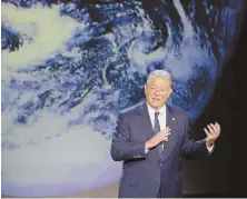  ??  ?? HEAT WAVE: Al Gore gives his updated climate change presentati­on, above. At left, Gore speaks in the Philippine­s with former Tacloban City mayor Alfred Romualdez and Typhoon Haiyan survivor Demi Raya.