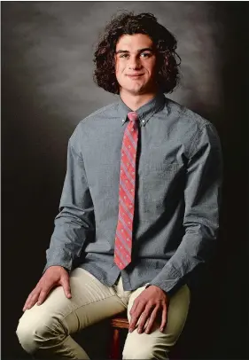  ?? DANA JENSEN/THE DAY ?? Fitch High School junior John Marcolina was named The Day’s 2018 All-Area Swimmer of the Year. Marcolina was the Eastern Connecticu­t Conference champion in the 50- and 100-yard freestyle events, as well as leading a pair of Falcons relay teams to...