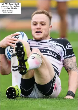  ?? CRAIG THOMAS/ NEWS IMAGES ?? Hull FC’S Adam Swift goes over for the final try against Warriors