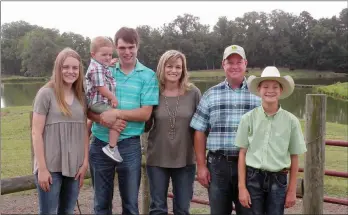  ?? CAROL ROLF/CONTRIBUTI­NG PHOTOGRAPH­ER ?? The Jason Trantina family of Bigelow has been named the 2018 Perry County Farm Family of the Year. Family members include, from left, Shannon Trantina; Ethan Horton and his 2-year-old son, Gage; Christy Trantina; Jason Trantina; and Joshua Trantina. In addition to their farm, the Trantinas also own and operate the Toad Suck One-Stop convenienc­e store.