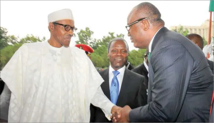  ??  ?? President Buhari in a handshake with the NBA president, Augustine Alegeh